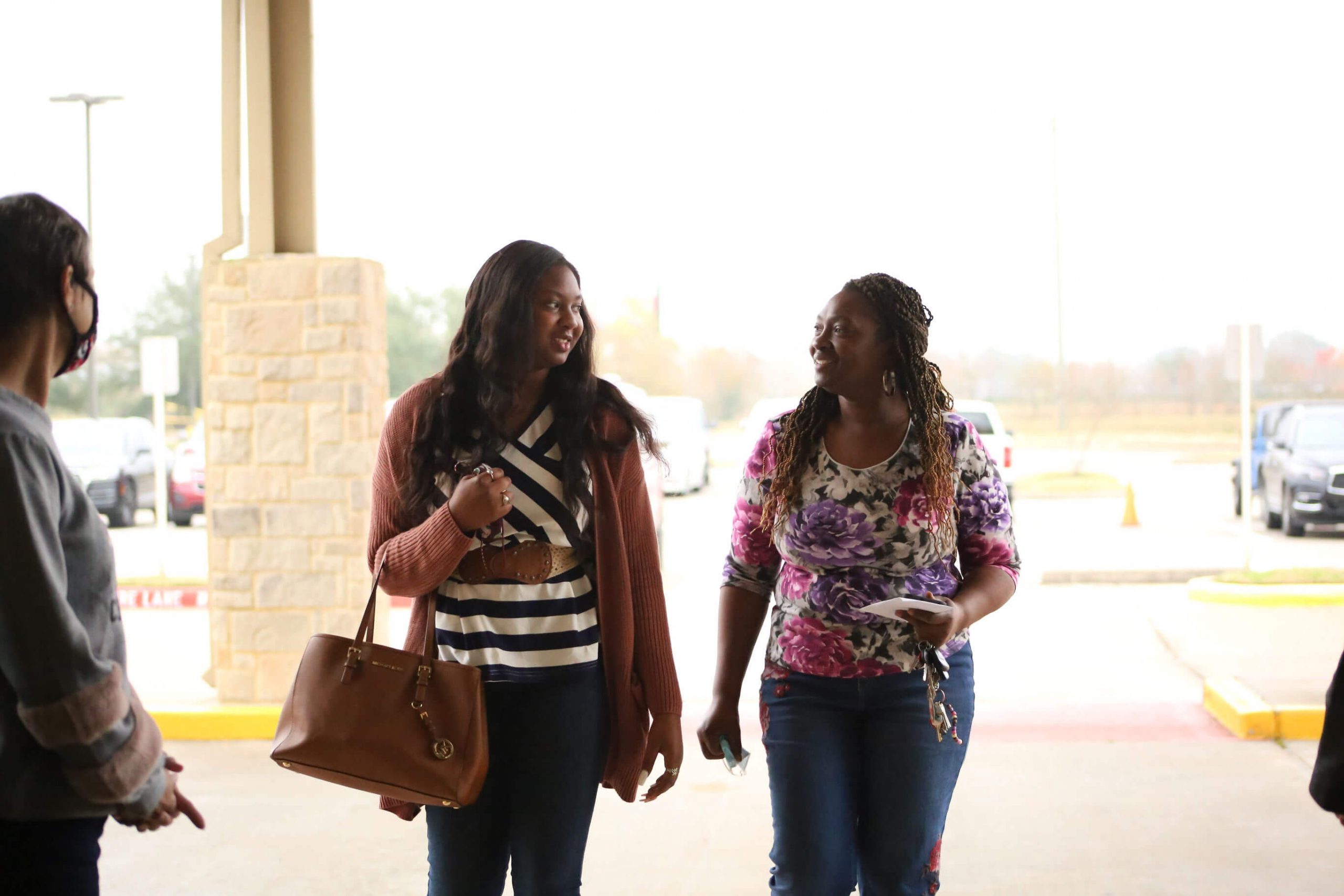 two women walking together