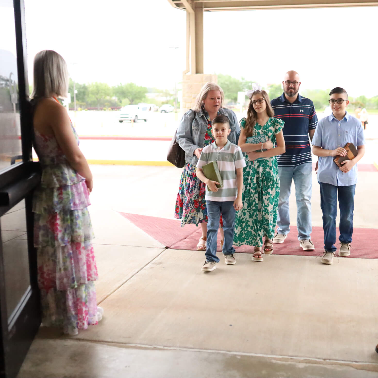 family walking into church